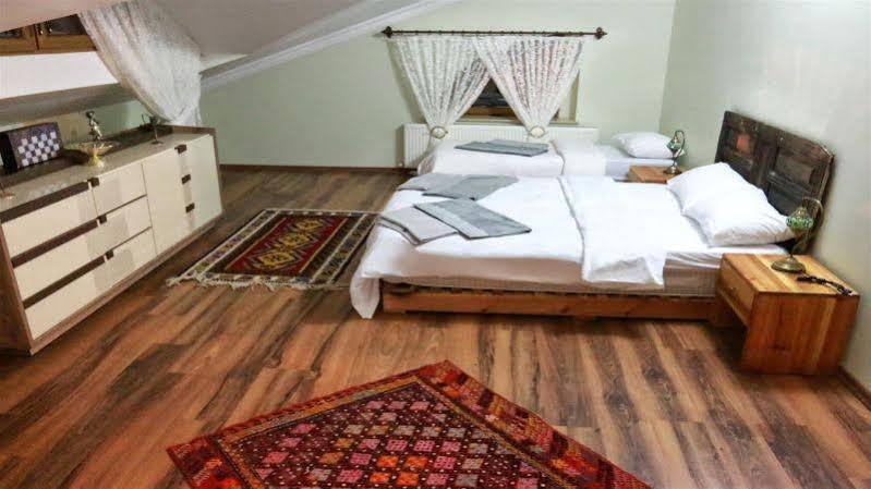 Uchisarstonehouse Hotel Nevşehir Bagian luar foto